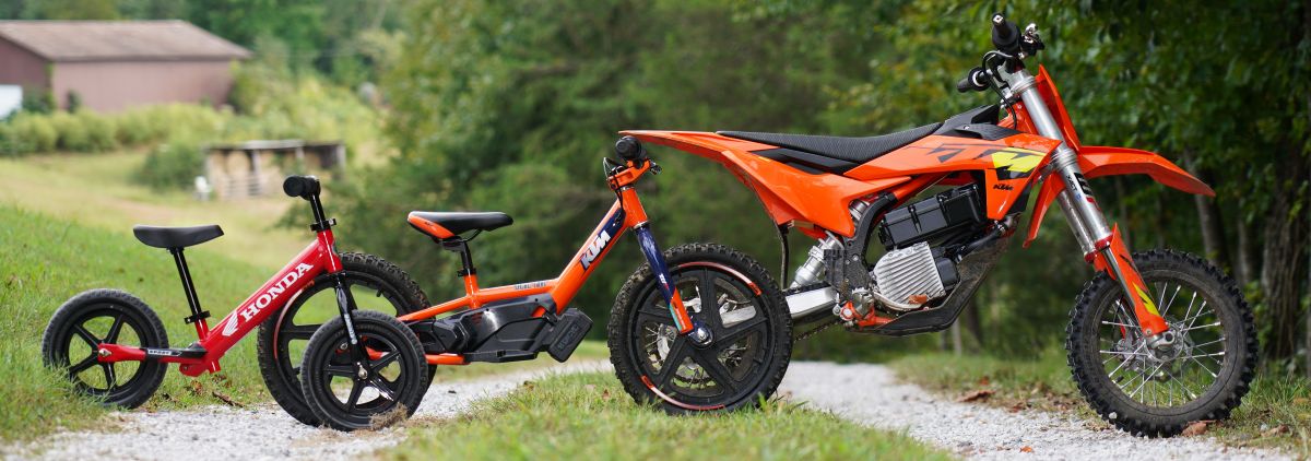 Children beginner bikes — Strider balance bike, STACYC, and KTM SX-E 5 youth motorcycles and e-bikes
