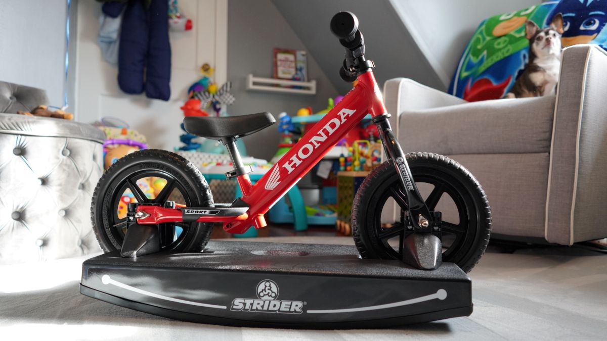 Strider balance bike on rocking base